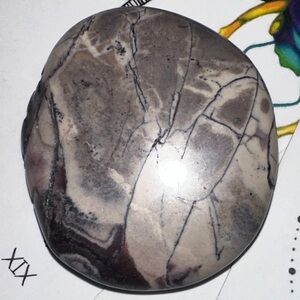 old Stock Polished Tiffany Opal (NV) worry stone.